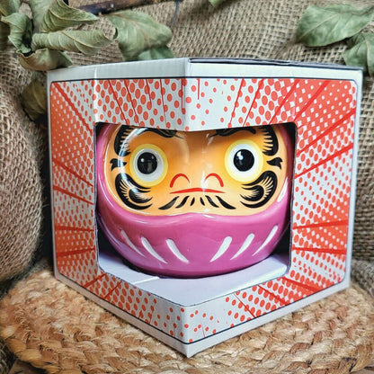 Bruciatore o bruciaessenze per tart profumate in ceramica con desing unico a forma di bambola daruma giapponese.